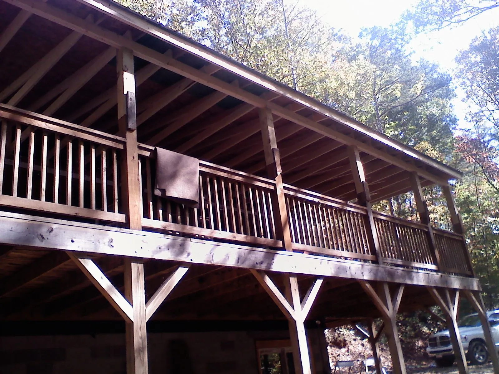 Timber framing under a new elevated porch and deck — Roof Leak Repair in East Texas by Roofing Brothers